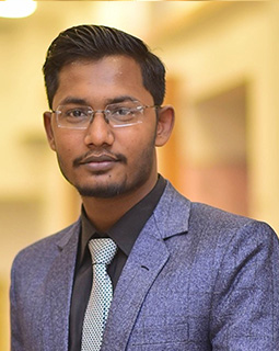 Portrait of Faiq Ahmed, Graphic Designer at Magnet Advertising
